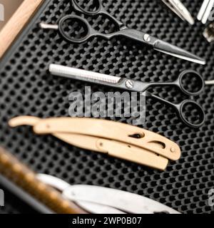 Set of barber's equipment and men's cosmetic products on light ...