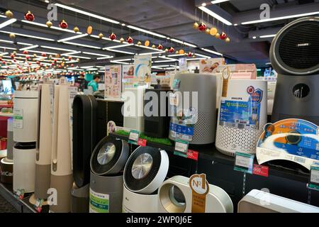 HONG KONG, CHINA - DECEMBER 04, 2023: consumer electronics for sale at Broadway Electronic store in New Town Plaza shopping mall. Stock Photo