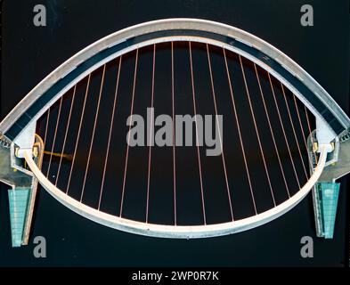 Spectacular, abstract view looking directly down on of the Millenium Bridge in Newcastle on a sunny September dawn Stock Photo