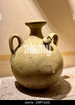 A clay jug called botijo in spanish. A traditional mud jar used to keep fresh water inside. Stock Photo