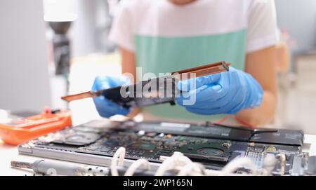 Technical engineer is working on computer motherboard Stock Photo