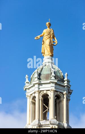 View of statue representing Fame, on top of central octagonal dome of the Bank of Scotland, the Mound, Edinburgh Stock Photo