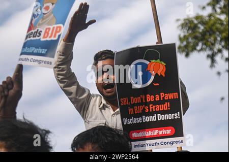 New Delhi, Delhi, India. 5th Mar, 2024. A member of the Indian Youth Congress, the youth wing of India's main opposition, the Indian National Congress, shouts slogans at a protest against the State Bank of India (SBI) for delaying to disclose details of electoral bonds data as ordered by the India's top court, the Supreme Court, in New Delhi, India on March 5, 2024. The Supreme Court of India had invalidated the electoral bonds funding scheme and instructed SBI to publish all details of the bonds to the Election Commission of India by March 6. (Credit Image: © Kabir Jhangiani/ZUMA Press Wire) Stock Photo