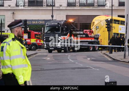 Tottenham Court Road, London, UK. 5th Mar 2024. Emergency services at the scene of a bus crash in a building near Center Point, Tottenham Court Road. Credit: Matthew Chattle/Alamy Live News Stock Photo