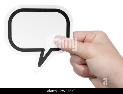 Hand holding a blank speech bubble isolated on white background. Template Mockup Stock Photo