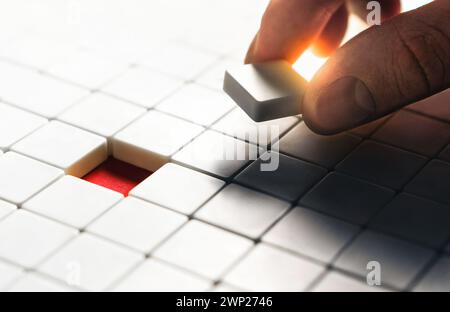 Solution to recruitment and labour match problem. Business success concept. Missing puzzle piece. Incomplete creative  strategy. Idea and innovation. Stock Photo