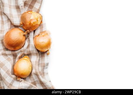 Fresh onions and napkin isolated on the white background. Stock Photo