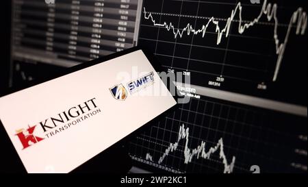 Konskie, Poland - March 03, 2024: Knight-Swift company logo displayed on mobile phone Stock Photo