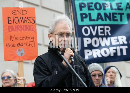 London, UK. 5th Mar, 2024. Doug Parr, Chief Scientist and Policy Director at Greenpeace UK, addresses environmental activists protesting outside the Department for Energy Security and Net Zero (DESNZ) against government plans to provide further public subsidies to tree-burning power plants Drax, in Yorkshire, and Lynemouth in Northumberland. Credit: Ron Fassbender/Alamy Live News Stock Photo