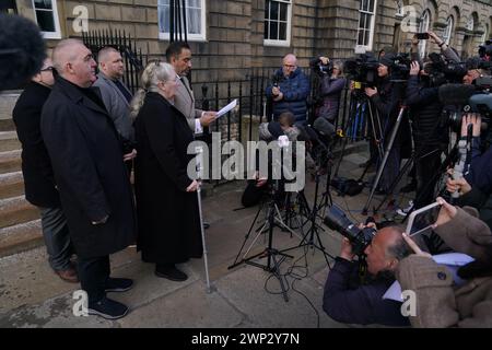 Margaret Caldwell (centre), mother of murder victim Emma Caldwell and lawyer Aamer Anwar (centre right) and other family members, speak to the media outside Bute House in Edinburgh, following a meeting with the First Minister of Scotland Humza Yousaf, after Mrs Caldwell's demands for a public inquiry into the failings surrounding the investigation into the murder of her daughter. Picture date: Tuesday March 5, 2024. Stock Photo