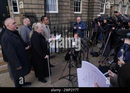 Margaret Caldwell (centre), mother of murder victim Emma Caldwell and lawyer Aamer Anwar (centre right) and other family members, speak to the media outside Bute House in Edinburgh, following a meeting with the First Minister of Scotland Humza Yousaf, after Mrs Caldwell's demands for a public inquiry into the failings surrounding the investigation into the murder of her daughter. Picture date: Tuesday March 5, 2024. Stock Photo