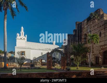 Our Lady of Altagracia Church & ruins of the Hospital of San Nicolas of Bari, Santo Domingo, Dominican Republic.  This was the first hospital built in Stock Photo