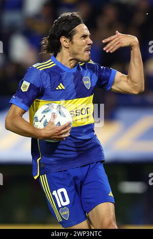 Boca Juniors' Uruguayan forward Edinson Cavani (L) jumps for head the ...