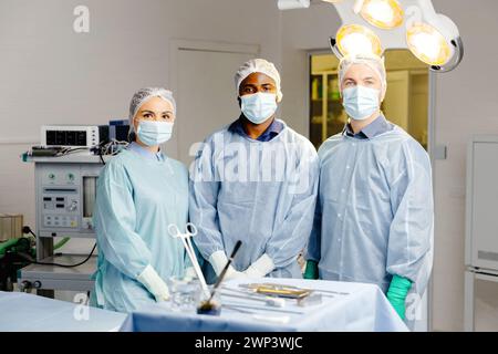 Group of doctors discussing patient cases around table. Stock Photo