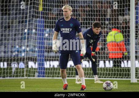 Kristoffer Klaesson of Leeds United warms up in front of Illan Meslier of Leeds United ahead of the Sky Bet Championship match Leeds United vs Stoke City at Elland Road, Leeds, United Kingdom, 5th March 2024  (Photo by James Heaton/News Images) Stock Photo