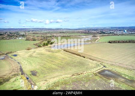 Aerial photo of the West Sussex countryside after heavy rainfall at Atherington and Climping beach. Stock Photo