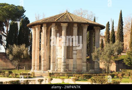 Temple of Hercules Victor, It is a Roman temple in Piazza Bocca della Verità, in Rome, Italy. It is a tholos, a round temple of Greek  design Stock Photo