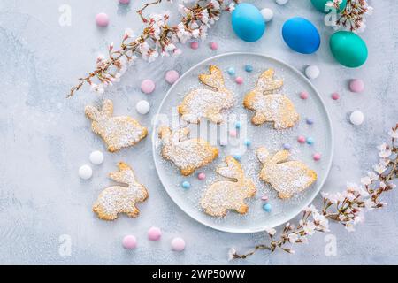 Homemade almond bunny cookies for Easter with Easter eggs Stock Photo
