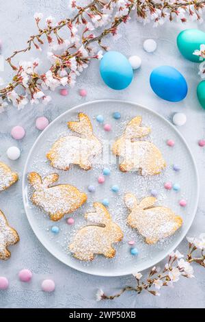 Homemade almond bunny cookies for Easter with Easter eggs Stock Photo