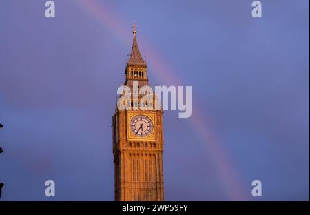 London, UK, 5th March, 2024. A rainbow was seen over the Elizabeth Tower (Big Ben) during golden hour. Credit: Eleventh Hour Photography/Alamy Live News Stock Photo