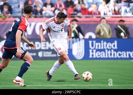 Foxborough Massachusetts, USA. 3rd Mar, 2024. Massachusetts, USA; Toronto FC defender Shane O'Neill (27) kicks the ball during the first half against the Toronto FC in Foxborough Massachusetts. Mandatory credit Eric Canha/CSM/Alamy Live News Stock Photo