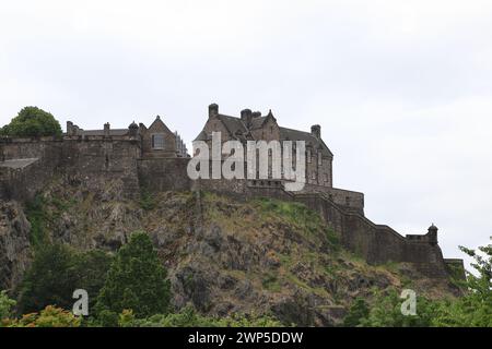 A view of Edinburgh Castle from Princes Street Gardens, Edinburgh.  The castle located on Castle Rock dates back  to the 11th century. Stock Photo
