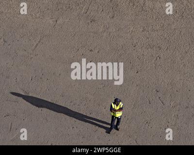 Shipping Industry / A security guard on duty in the Port of Noumea, New Caledonia. Stock Photo