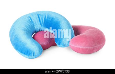 Pink and blue travel pillows isolated on white Stock Photo