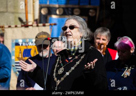 Truro, UK. 5th March 2024. Mayor of Truro Carol Swain speaks to the crowd outside Truro Cathedral for St Piran's Day. Credit: Kai Greet/Alamy Live News. Stock Photo