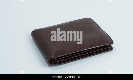 Leather textured brown wallet isolated on white background Stock Photo