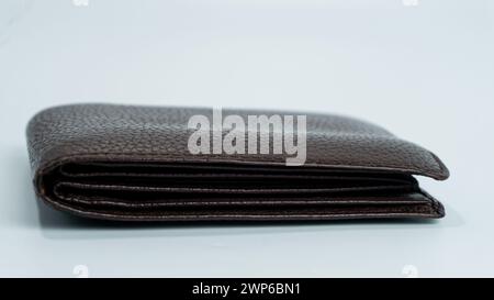 Leather textured brown wallet isolated on white background Stock Photo