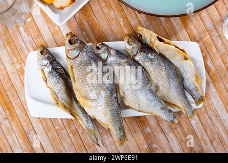 Dried roaches served on plate Stock Photo