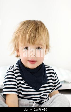 Close-up shoulder photo ID identification card little cute 2 years caucasian boy Stock Photo