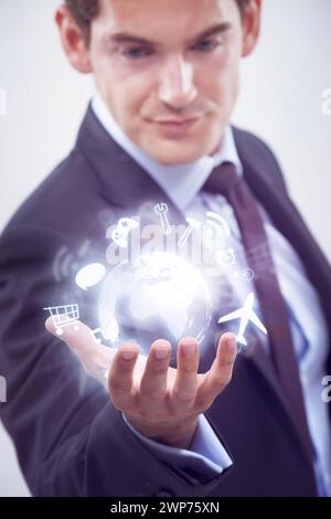 Businessman, hand and futuristic digital globe in studio isolated on a white background. World, hologram and professional with planet earth for Stock Photo