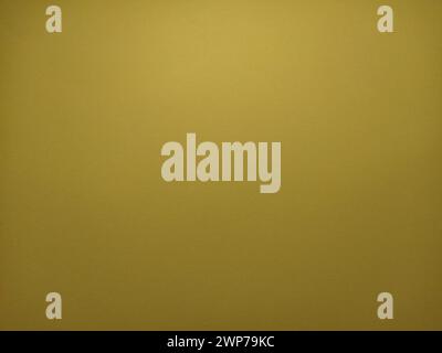 Yellow or ocher background. A dist of colored paper, dimly lit from below. The play of light and shadow. Shadows on the upper edges of the sheet. Can Stock Photo
