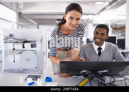 Colleagues, touchscreen monitor and 3d printer in office for software development, digital and technology at company. Diverse, coworkers or employees Stock Photo