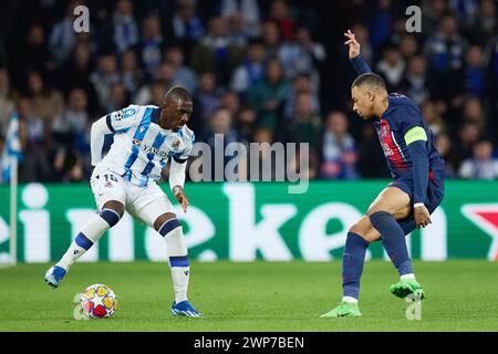 Hamari Traore of Real Sociedad competes for the ball with Kylian Mbappe of Paris Saint-Germain during the UEFA Champions League, Round of 16, 2nd leg football match between Real Sociedad and Paris Saint-Germain on March 5, 2024 at Reale Arena in San Sebastian, Spain Stock Photo