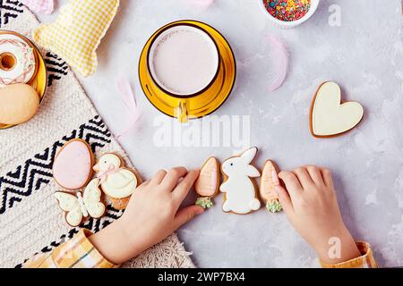 Delightful cocoa and cookies. Easter vibes for kids. Happy Easter background Stock Photo