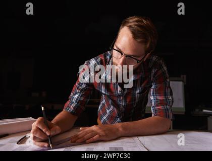 Man, architect and thinking of blueprint, working and planning for construction. Architecture, building and engineering for infrastructure, design and Stock Photo