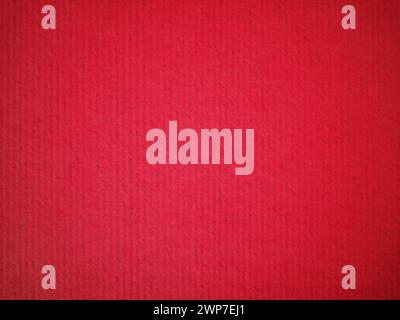 A sheet of bright red paper with barely noticeable vignetting around the edges. Passionate red saturated color. Paper texture. Background whether post Stock Photo