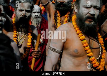 Kathmandu, Nepal. 06th Mar, 2024. Sadhus, holy men known as the followers of Lord Shiva take part in a religious rally for the upcoming Maha Shivaratri festival inside Pashupatinath Temple. Thousands of sadhus from India and Nepal come to celebrate the festival of Maha Shivaratri by smoking marijuana, smearing their bodies with ash, and offering prayers devoted to the Hindu Deity Lord Shiva. Credit: SOPA Images Limited/Alamy Live News Stock Photo