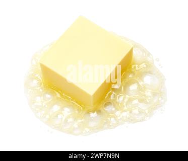 Cube butter melting isolated on white background Stock Photo