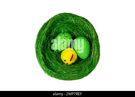 A decorative artificial nest with eggs and chick for Easter Stock Photo