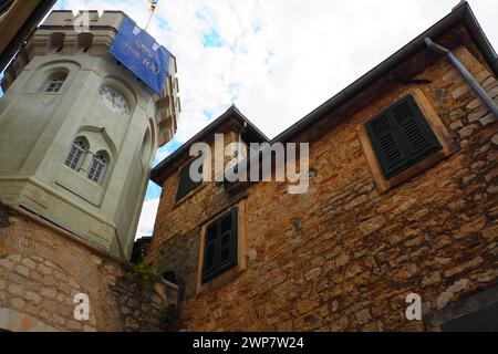 Herceg Novi, Montenegro, old town, Sat-kula tower, Sahat-kula, Tora, chapel tower or Clock tower 08.09.22 Tourists walk along the aisle under the city Stock Photo