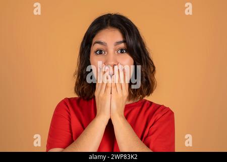 Portrait of surprised young middle eastern woman Stock Photo