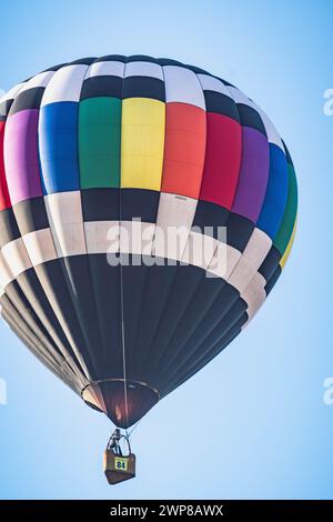 A vibrant hot air balloon soaring in Iowa Stock Photo