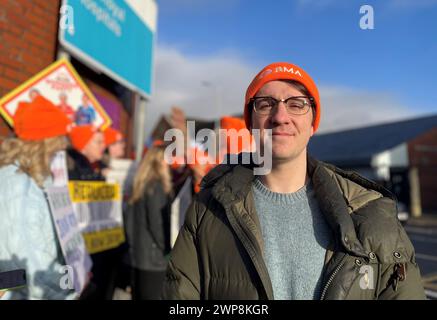 Deputy chair of the British Medical Association's Northern Ireland junior doctor committee, Dr Steven Montgomery, who works in Royal Belfast Hospital for Sick Children, joins junior doctors on the picket line outside the Royal Victoria Hospital in Belfast as a 24-hour strike over pay begins. Picture date: Saturday May 13, 2023. Stock Photo