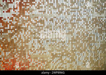 wall made of many square sparkling sequins. event decoration on photo zone. bright abstract background swaying in the wind. High quality photo Stock Photo