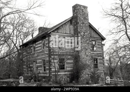 Rustic Log Cabin With Stone Chimney Stock Photo