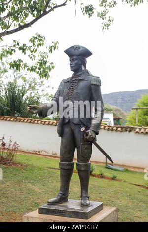 Tiradentes, Minas Gerais, Brazil - October 07, 2023: Tiradentes metal statue representing the young ensign on a public road Stock Photo